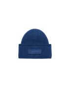 Le bonnet en Laine bleu