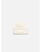 Le bonnet en Laine beige