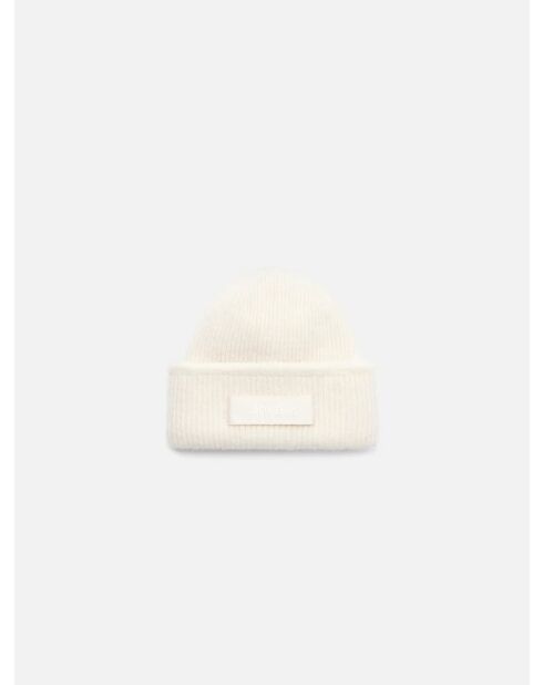 Le bonnet en Laine beige