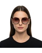 Lunettes de soleil Tencia hexagonales dorées rose
