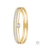 Edelstahlarmband, verziert mit funkelnden Goldkristallen