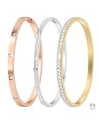 3 Edelstahlarmbänder, verziert mit funkelnden Goldkristallen