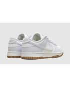 Graue Fußballschuhe Dunk Low Next Nature