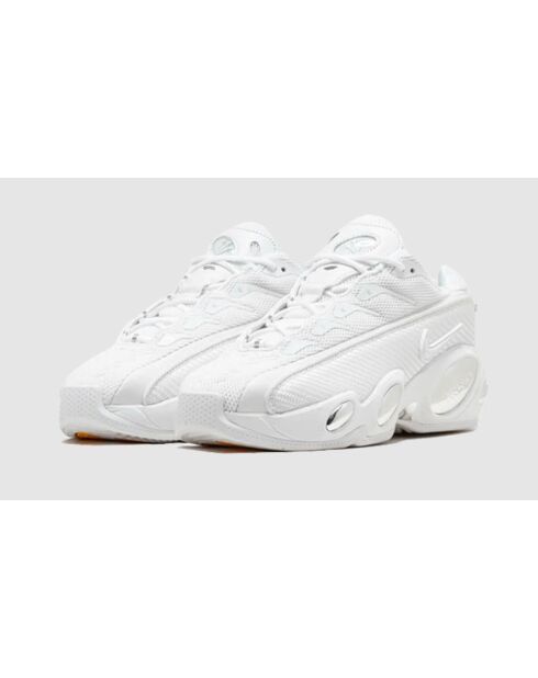 Sneakers NOCTA Glide Drake bianche e cromate