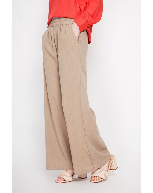 Camelkleurige broek van linnenmix met hoge taille en wijde pijpen van Raymonde