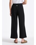 Pantalones anchos Sophia con solapa grande en jersey negro con hebilla