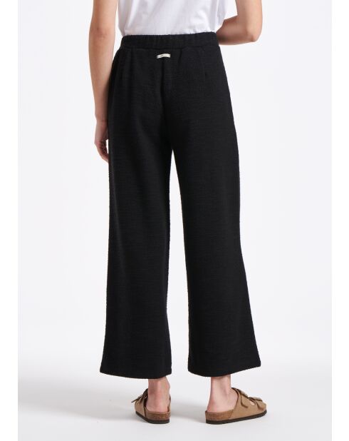 Pantalones anchos Sophia con solapa grande en jersey negro con hebilla