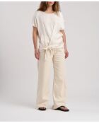 Jaisuke ecru effen satijnen top met strikceintuur