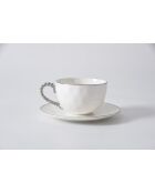 Taza y platillo de té blanco y dorado de Salerno