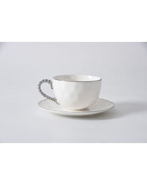 Taza y platillo de té blanco y dorado de Salerno