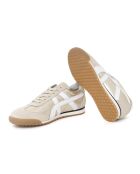 Baskets en cuir et en daim Chic dorées