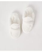 Nieuwe witte muiltjes van Harold