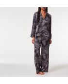 Nailea-broek gedrukt op een zwarte achtergrond