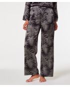 Nailea-broek gedrukt op een zwarte achtergrond