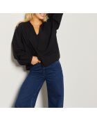 Een zwarte blouse van Confiance