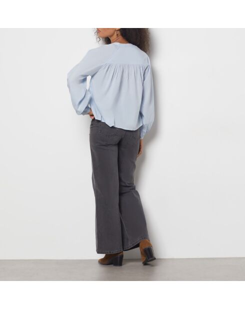 Una blusa blu azzurra Confiance