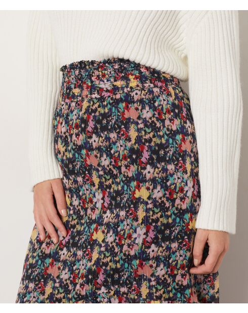 Falda Ralo estampada sobre fondo verde