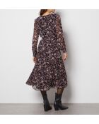 Pauline jurk gedrukt op een zwarte achtergrond