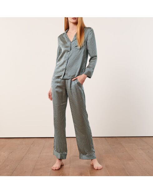 Rugbroek met groene achtergrondprint