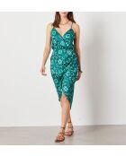 Lenah-jurk gedrukt op een groene achtergrond