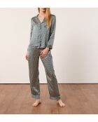 Rugbroek met groene achtergrondprint