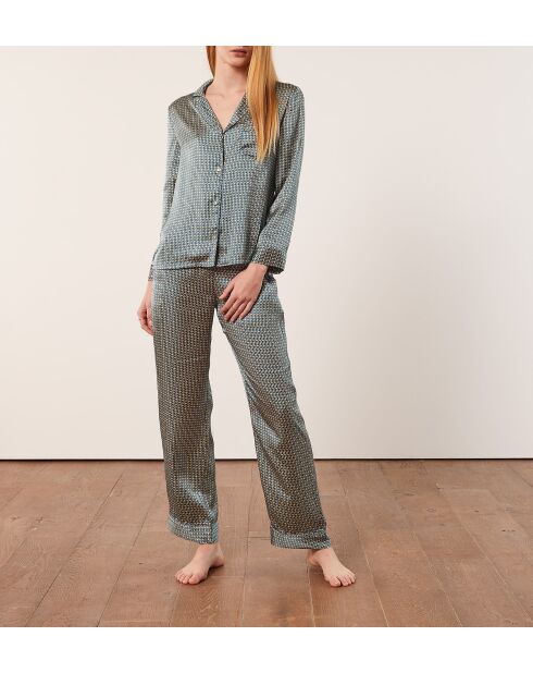 Rugbroek met groene achtergrondprint