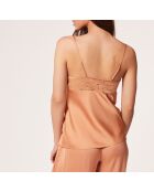 Canotta con girasole e sabbia