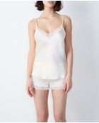 Camisola de perlas lechosas