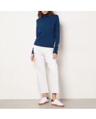 Jersey de cuello alto entrecruzado con estampado de fondo verde