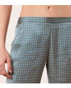 Rugbroek met groene achtergrondprint