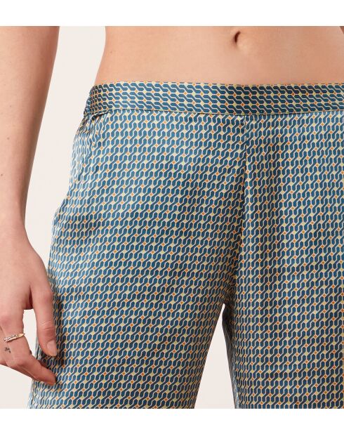 Rugbroek met groene achtergrondprint