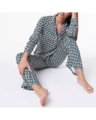 Pantalones Levri con estampado de fondo verde