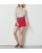 Blusa Laurie ray con estampado de fondo rosa