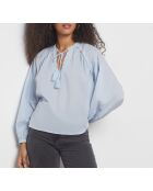 Una blusa blu azzurra Confiance