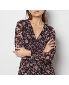 Pauline jurk gedrukt op een zwarte achtergrond