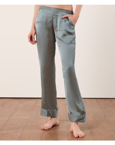 Rugbroek met groene achtergrondprint