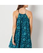 Linoh-Kleid gedruckt auf grünem Hintergrund