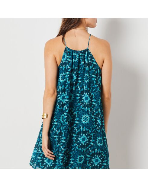 Linoh-jurk gedrukt op een groene achtergrond