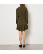 Ein olivfarbenes Kleid von Pepy in Khaki