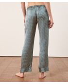 Rugbroek met groene achtergrondprint