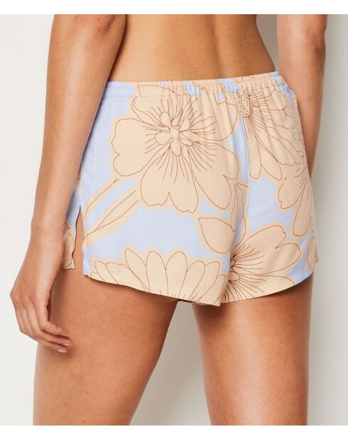 Magnolia-short met paarse achtergrondprint