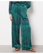 Voice-broek met groene achtergrondprint