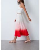 Cardinale Eden e gonna bianca