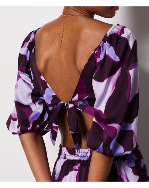 Uzes top met paarse achtergrondprint