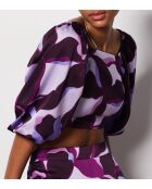 Uzes top met paarse achtergrondprint