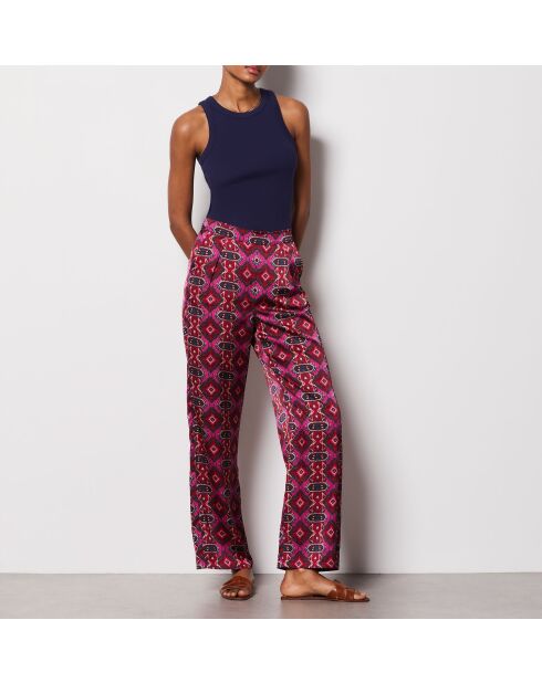 Pantalon blanca imprimé fond violet