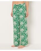 Vijay bedrukte broek op groene achtergrond