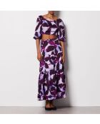 Falda Uzes estampada sobre fondo morado