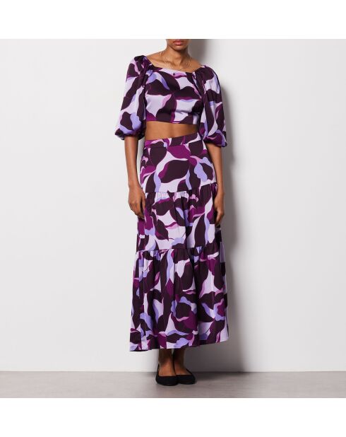 Falda Uzes estampada sobre fondo morado