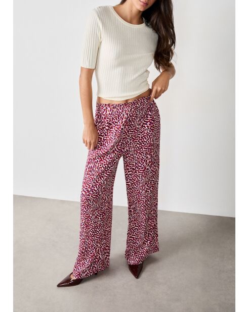 Broek met Solange print op een witte achtergrond